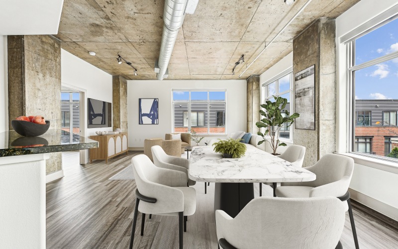 dining area with table and large windows